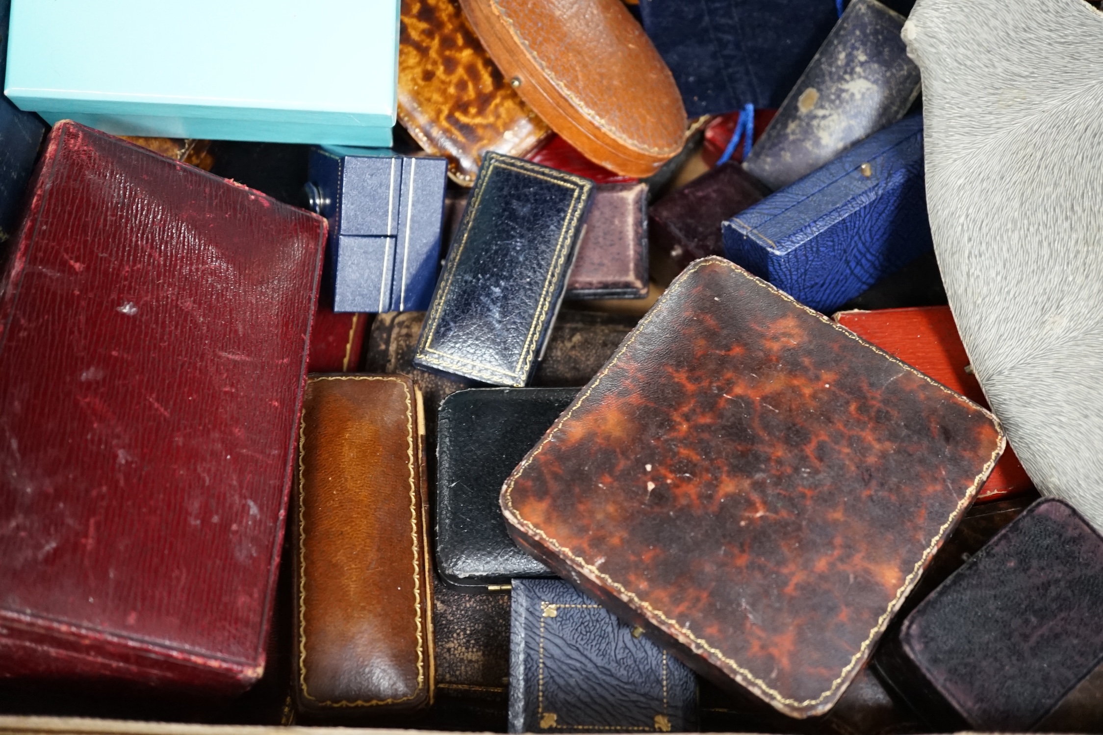 A large quantity of mixed jewellery boxes together with a larger jewellery box.